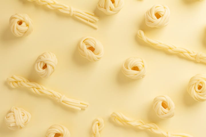 Cheese Knots And Twists Dancing On A Soft Canvas