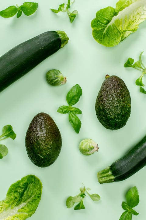 Green Harmony: Fresh Vegetables on Pastel Canvas