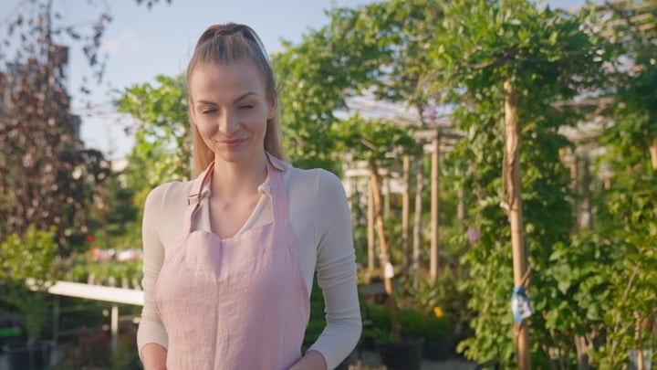 Sunlit Greenhouse Moments With A Joyful Gardener
