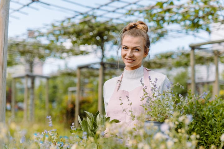 Bright Smiles Amidst The Greenhouse Serenity
