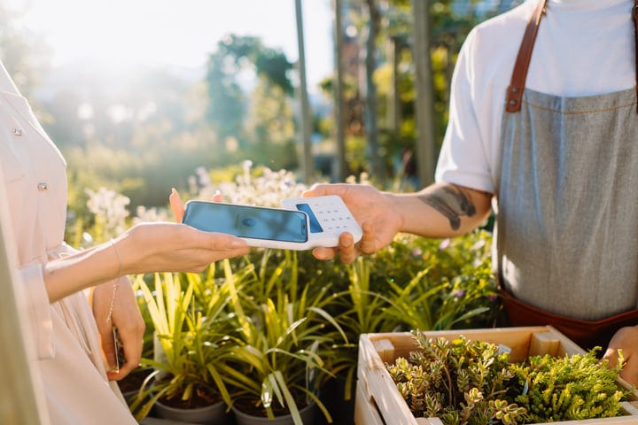 Contactless Payment Blossoms in a Vibrant Greenhouse