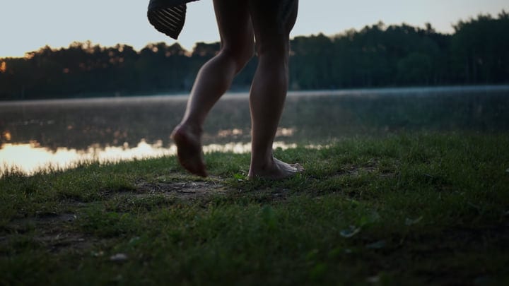 Barefoot Steps Towards a Chilly Morning Swim