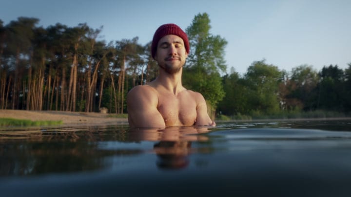 Morning Serenity: Man Embraces Cold Water Swim