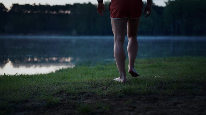 Barefoot Stroll Toward The Misty Lakeside Dawn