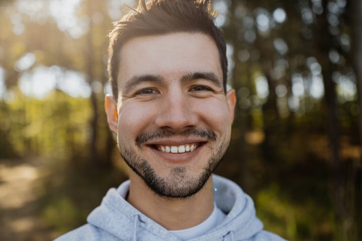 Smiling Man Enjoys a Refreshing Morning Walk