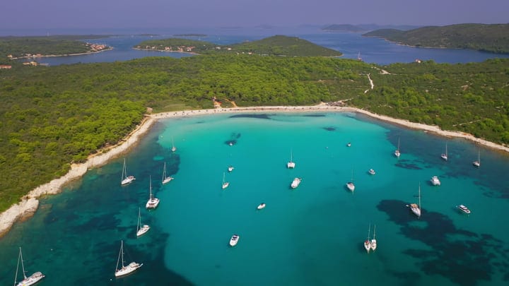 Sailboats Dance in the Turquoise Waters of the Bay