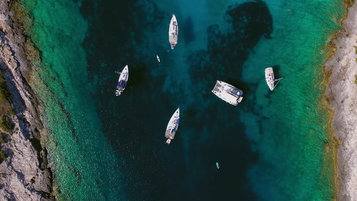 Sailboats Rest in the Tranquil Turquoise Bay Waters