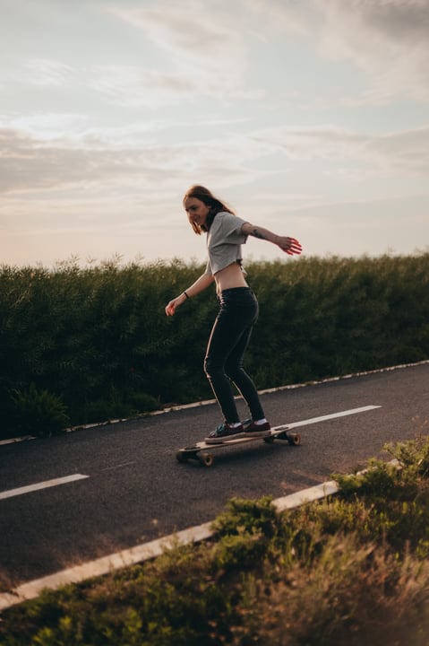 Sunset Ride Along a Country Road on Skateboard