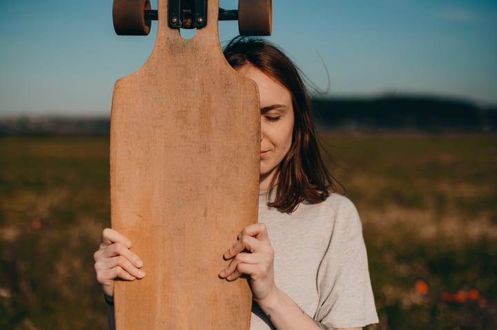 Quiet Moment Behind The Longboard On A Sunny Day