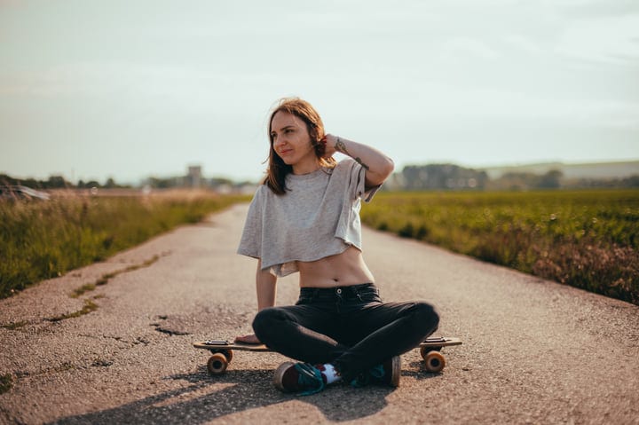 Casual Afternoon on a Country Road With Skateboard