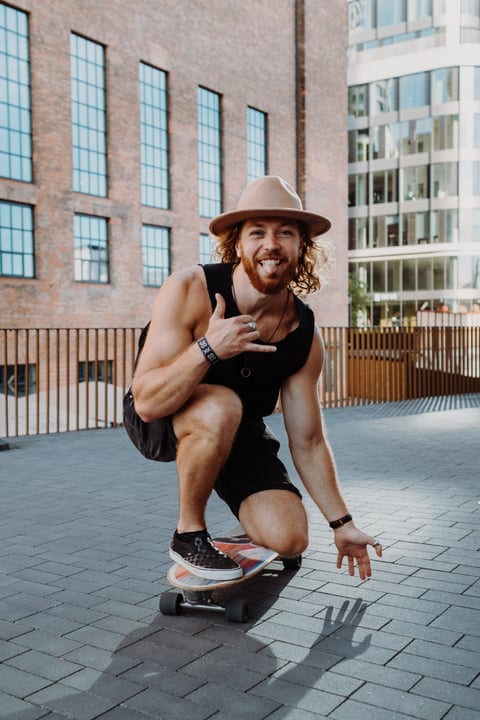 Urban Skater Catches Golden Light On City Streets