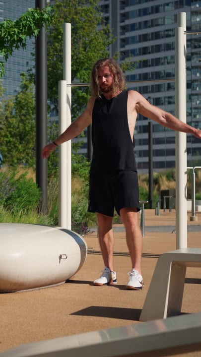 Sunlit Skater Balances on an Urban Playground