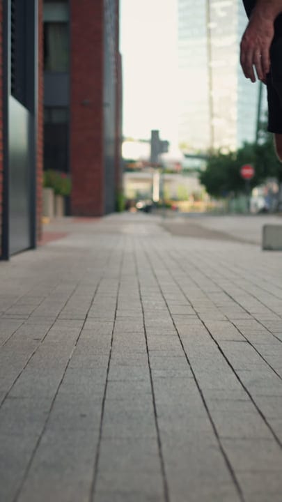 Skater's Journey Through Urban Sunset Streets