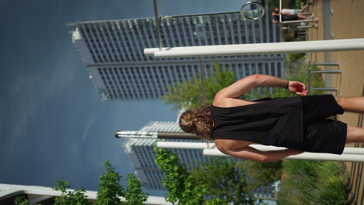 Skater Embraces Urban Sunset Energies In The City
