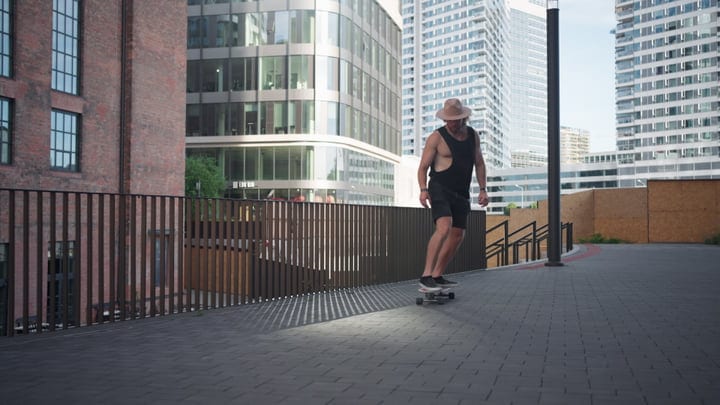 Skater Glides Effortlessly Through Modern Urban Landscape