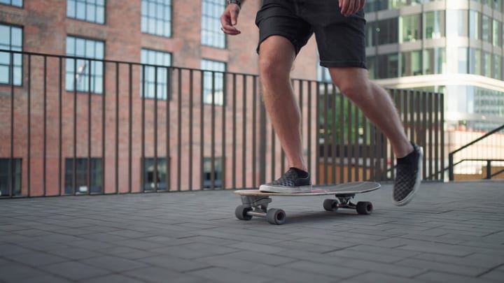 Effortless Glide Through Urban Brick Jungle At Dusk