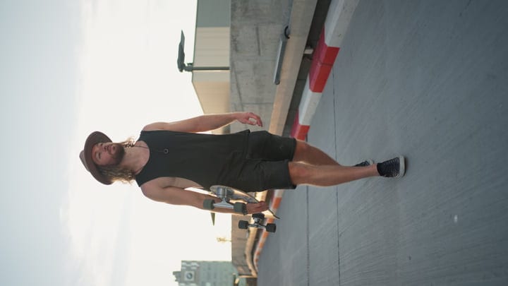 Skater Embraces the Urban Sunset with Confidence