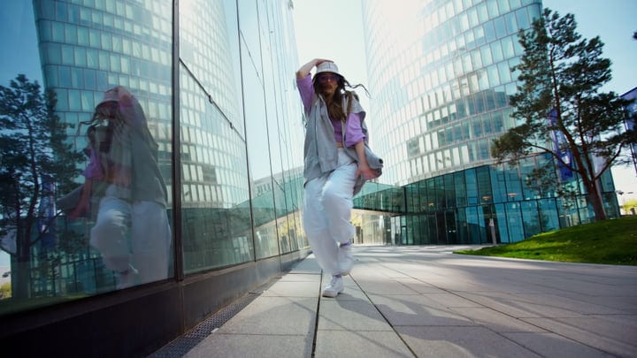 Urban Rhythms Echo Against Glass Towers