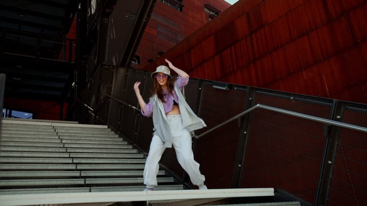 Dynamic Dance Moves On Urban Stairs In Autumn Light