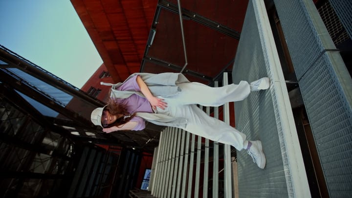 Urban Dancer Twists Gracefully Against Modern Architecture