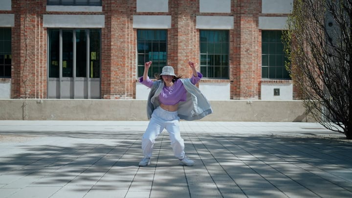 Dynamic Moves In A Sunlit Urban Setting
