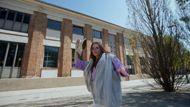 Street Dancer's Graceful Spin On A Sunny Day