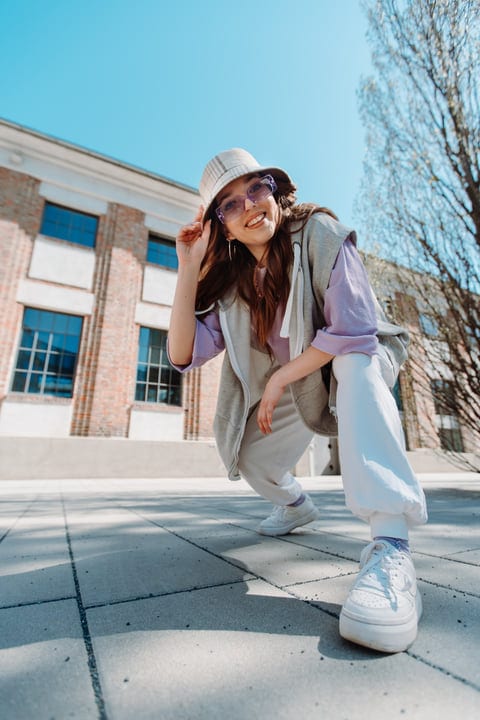 Street Dancer Exudes Joy Under a Clear Blue Sky