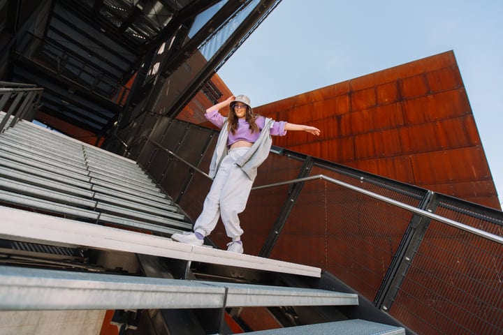 Joyful Street Dancer Embraces the Urban Stage
