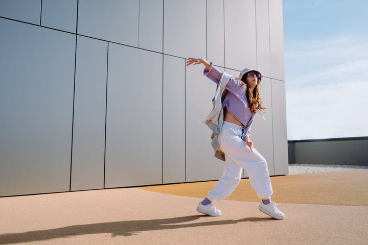 Energetic Movement Against an Urban Architectural Backdrop