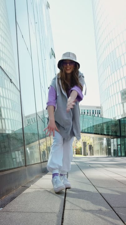 Joyful Street Dance in the Urban Glass Jungle