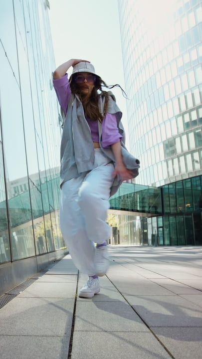 Youthful Energy Explodes Amidst Urban Architecture