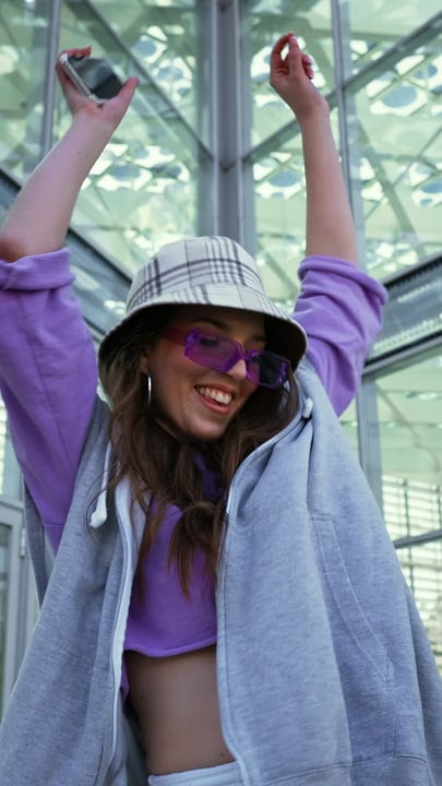 Joyful Moves Under Glass Skylights In Urban Scene