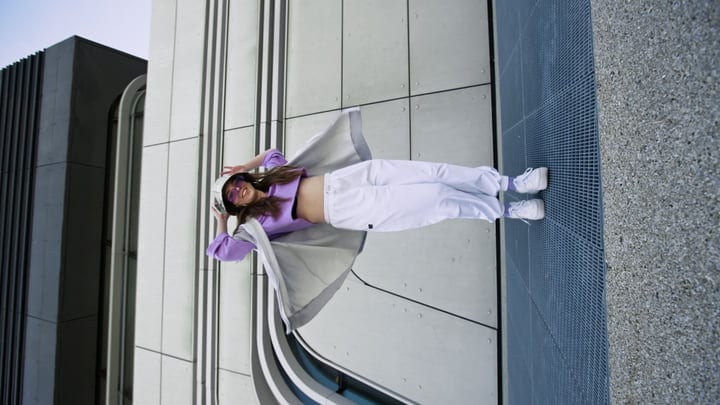 Urban Dancer Embraces the Rhythm in Cityscape