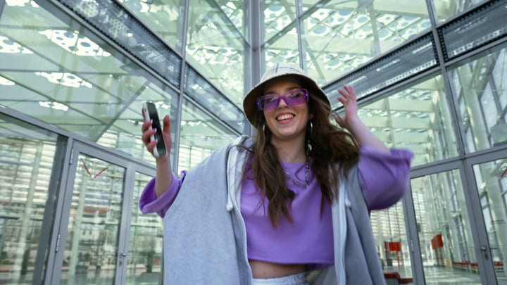 Vibrant Street Dance Energizes Urban Glass Atrium