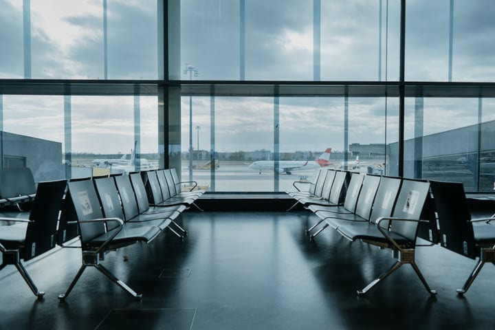 Empty Terminal Seats Overlooking the Tarmac at Dawn