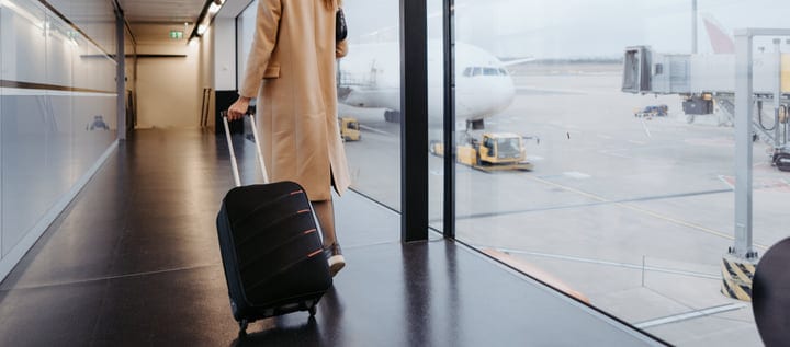 Traveler Walks Towards Boarding Gate With Confidence