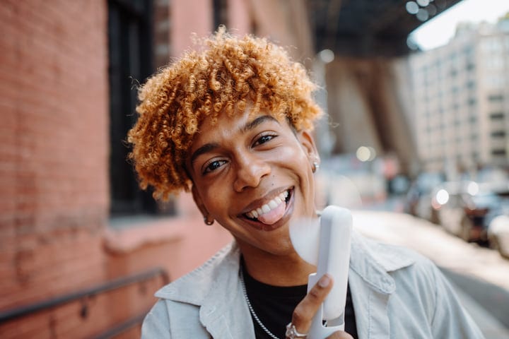 Youthful Energy Radiates On A Sunny City Street