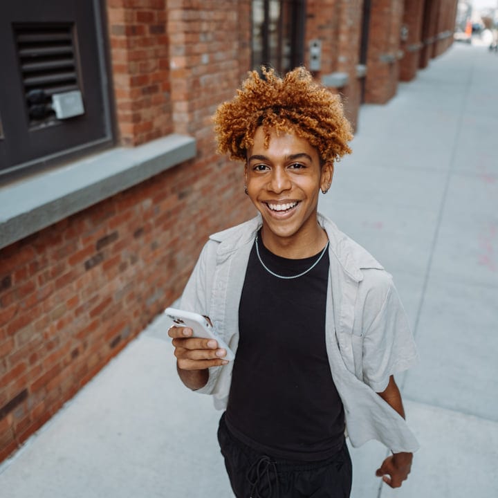 Energetic Youth Enjoys A Vibrant Day In The City Streets