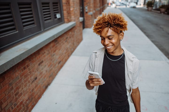 Youthful Connection On A Sunlit New York Street