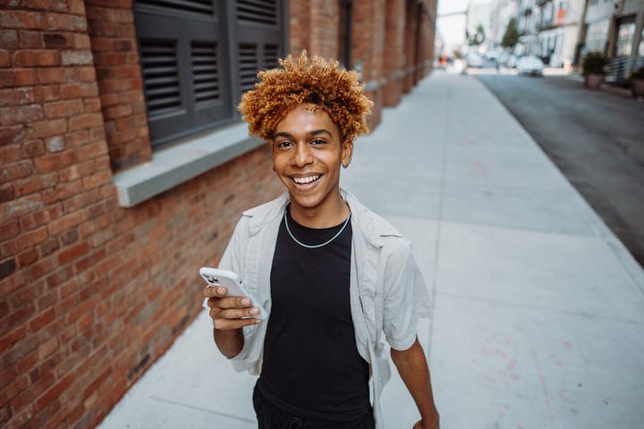 Lively Youth Exploring NYC with Phone in Hand
