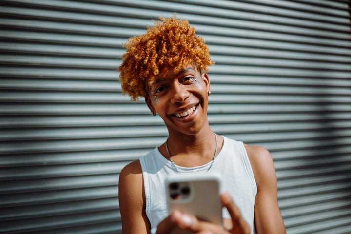 Joyful Teen Connecting With Friends In Urban Setting