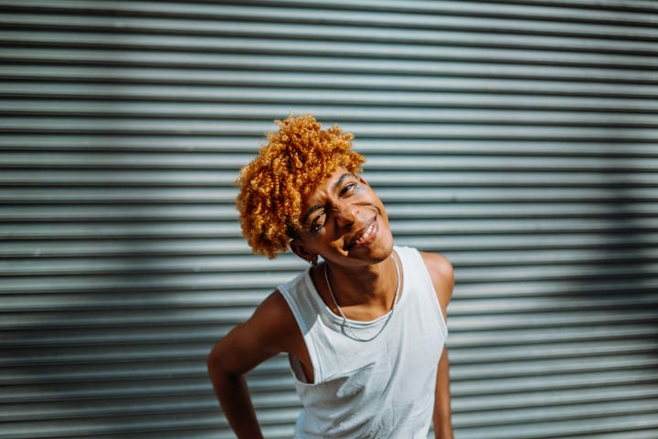 Youthful Confidence Shines Against Urban Backdrop In NYC