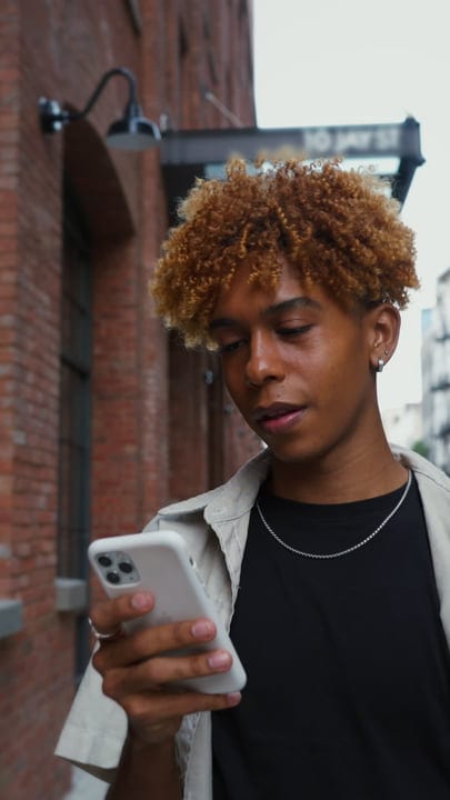 Youthful Curiosity Captured On New York Street