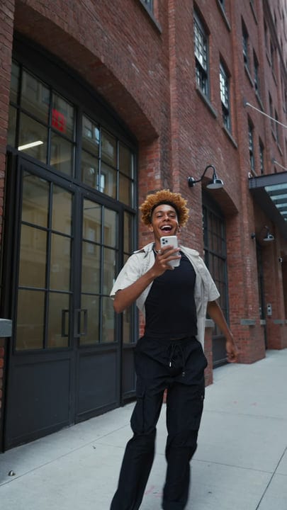 Joyful Youth Embraces Urban Energy On NYC Streets
