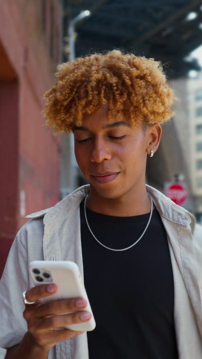 Youthful Connection Blossoms On A Vibrant NYC Street