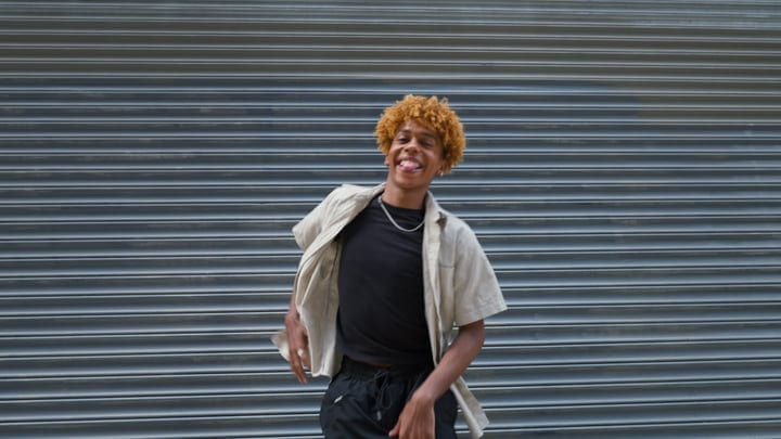 Youthful Energy Bursts Against Urban Backdrop in NYC