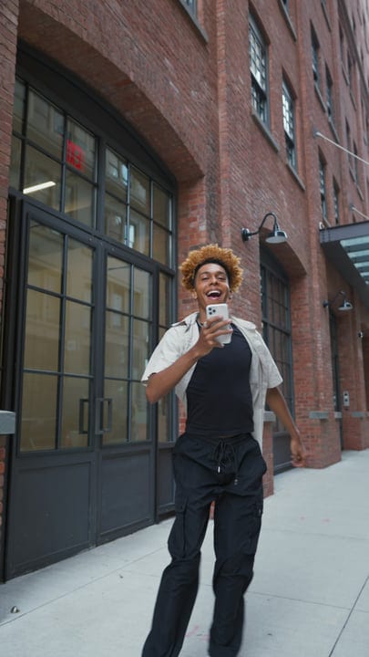Energetic Youth Embraces Urban Life With Joyful Laughter