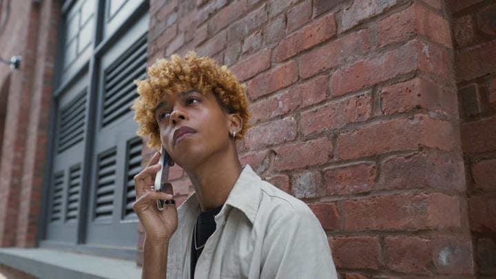 Young Urbanite Engages in a Meaningful Phone Call