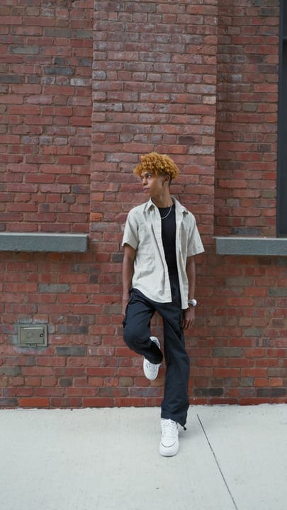 Youthful Style Against a Brick Wall in NYC
