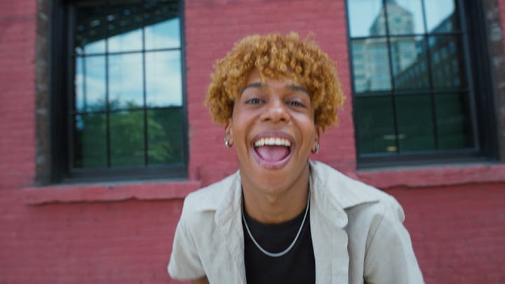Joyful Energy Of Urban Youth Against Brick Backdrop